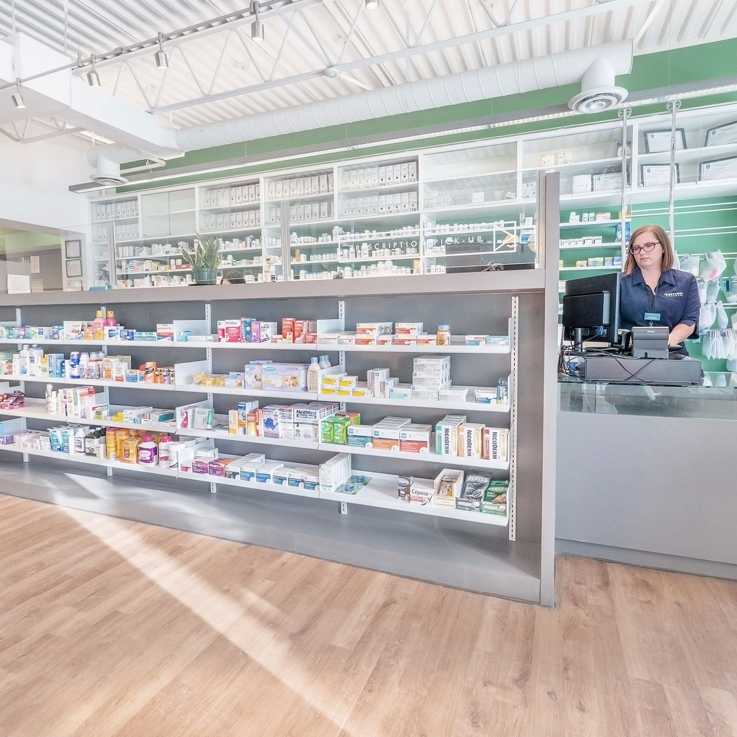 Pharmacist filling prescriptions